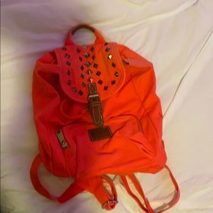 This is a pink small little bag